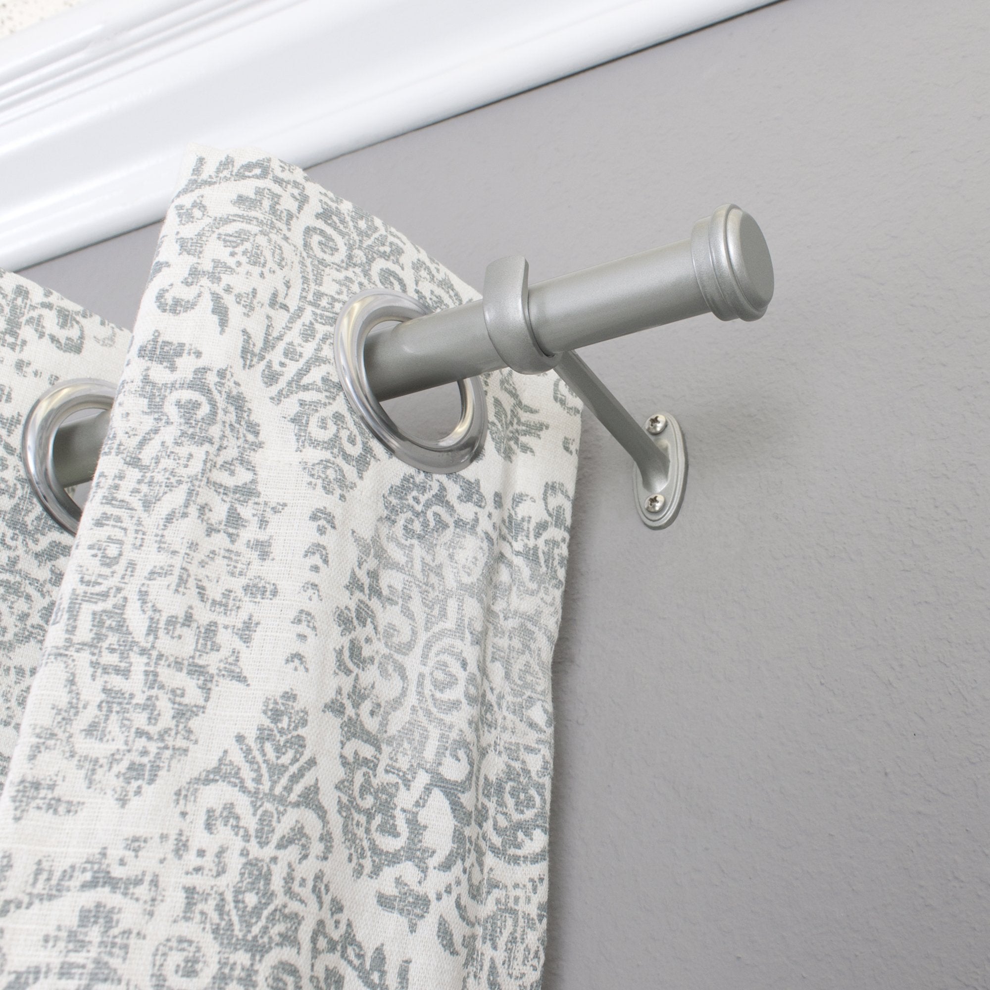 Decopolitan rod in use in bedroom showing curtains hung and improved privacy and style
