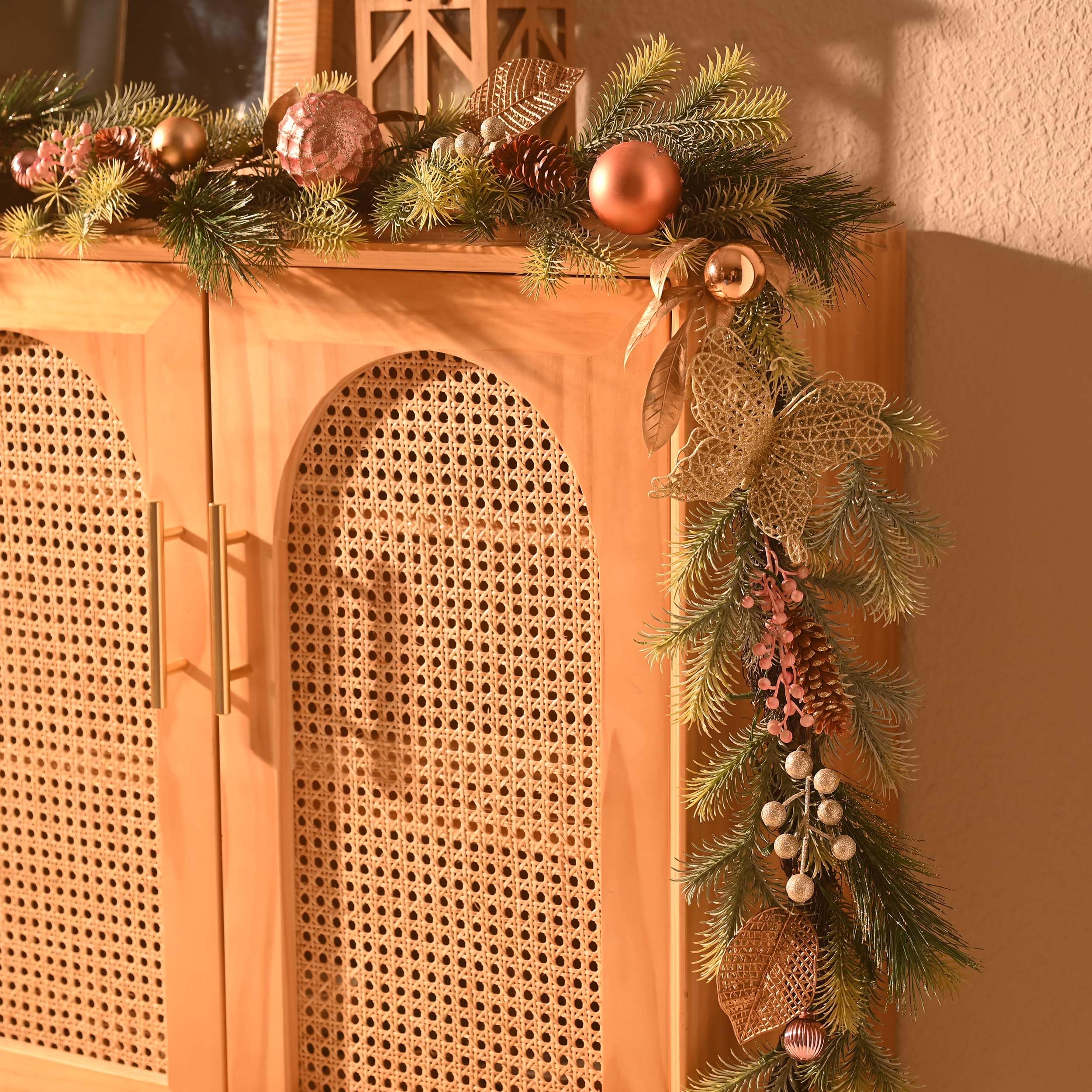 Decor by Hannah close-up of Norfolk pine and pine cone adds realism