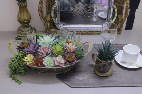 DECOROUS succulents tucked into a wreath showcasing decorative versatility