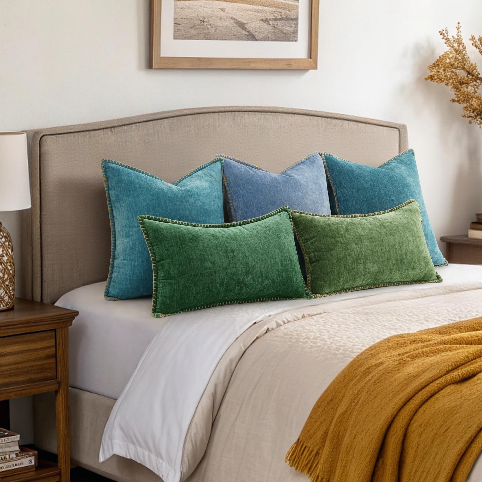 decorUhome pillows styled on bed create layered cozy bedroom vibe