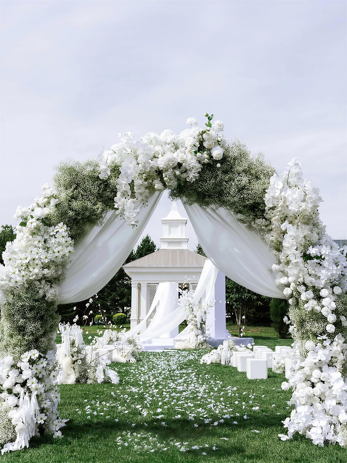 DEEMEI wedding arch adorned with sprays showing cohesive décor enhancement