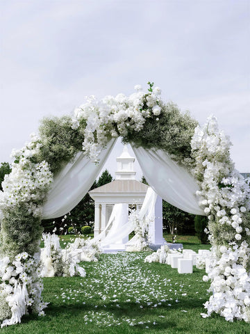 DEEMEI wedding arch adorned with sprays showing cohesive décor enhancement