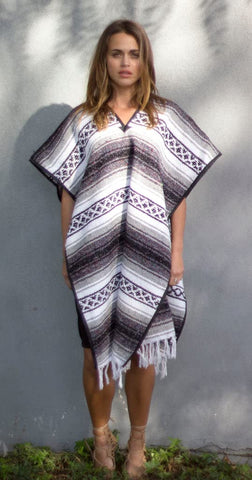 Del Mex poncho collar and hem detail showing reinforced edges and durability benefit