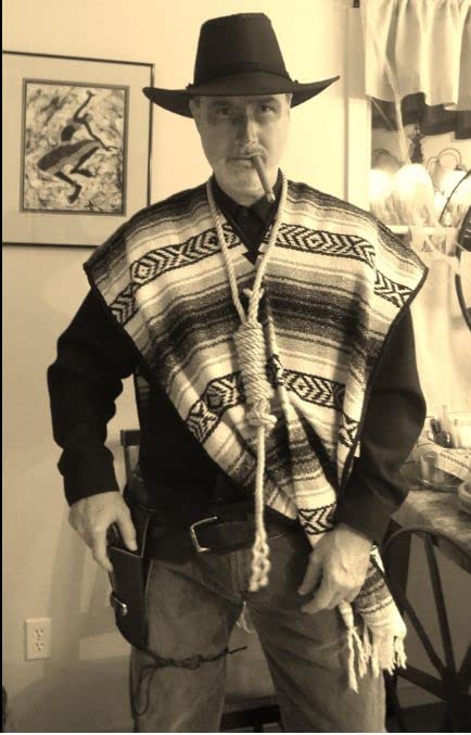 Del Mex poncho worn outdoors demonstrating lightweight layer benefit for travel