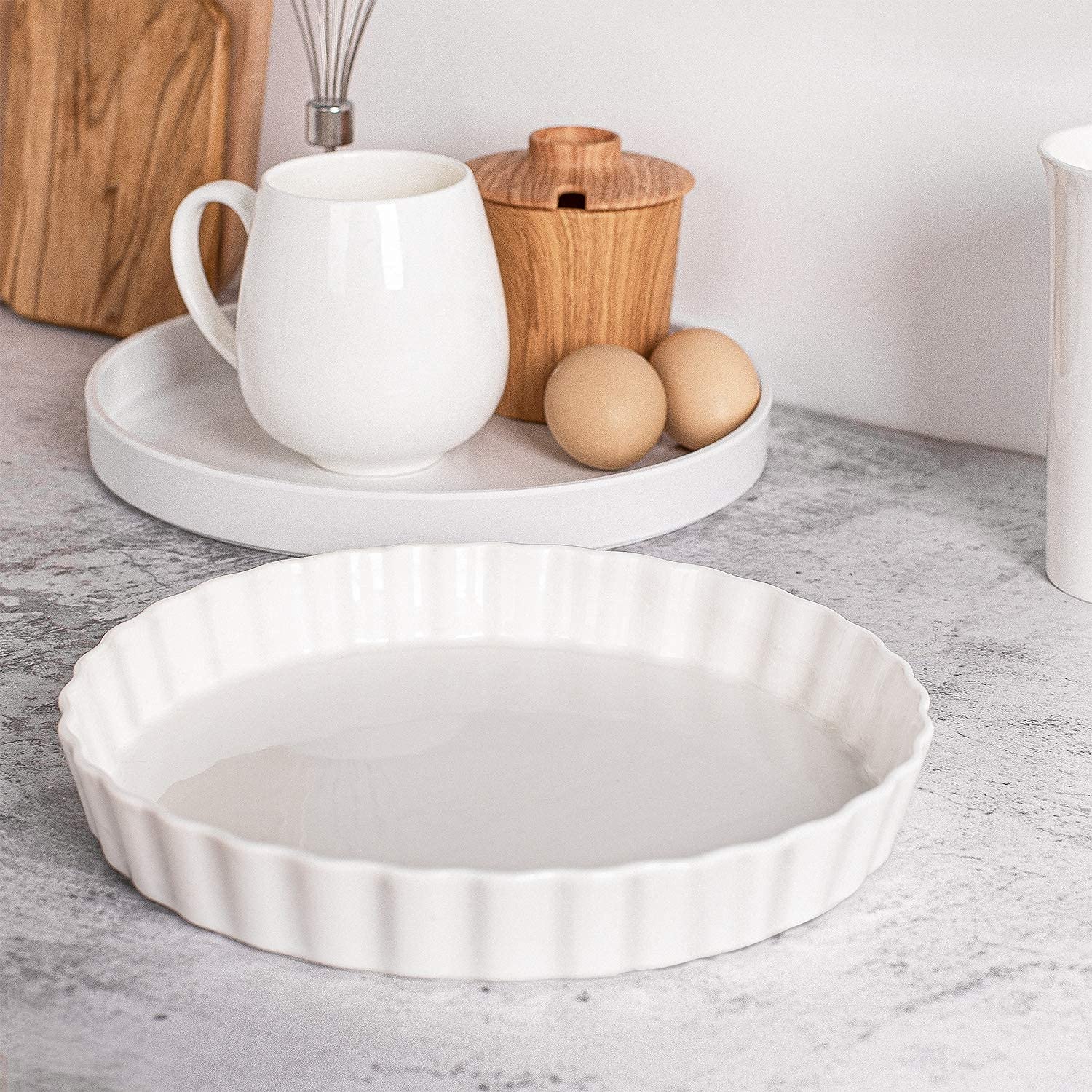DELLING pan beside fork for scale showing 9.5 inch size and portion guidance