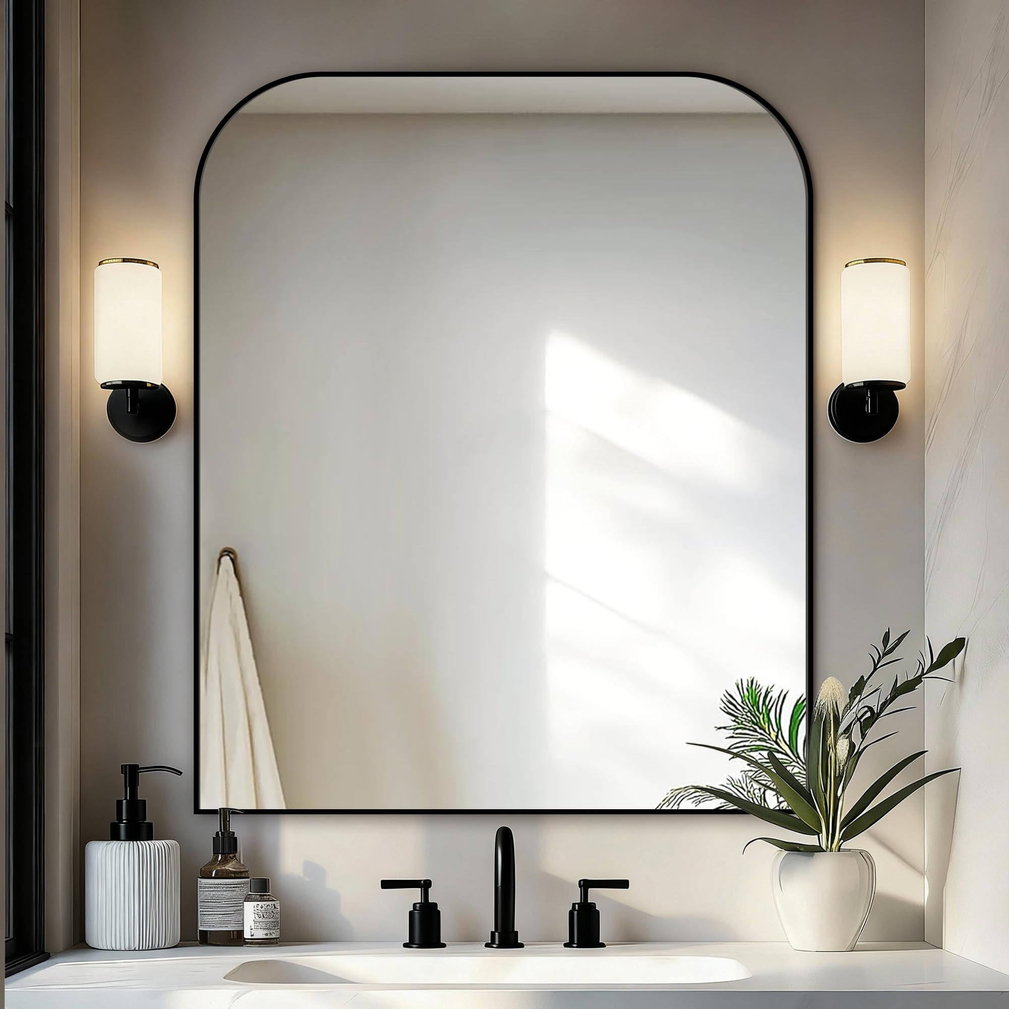 Delma front view black metal framed mirror showing clean modern look and precise reflection