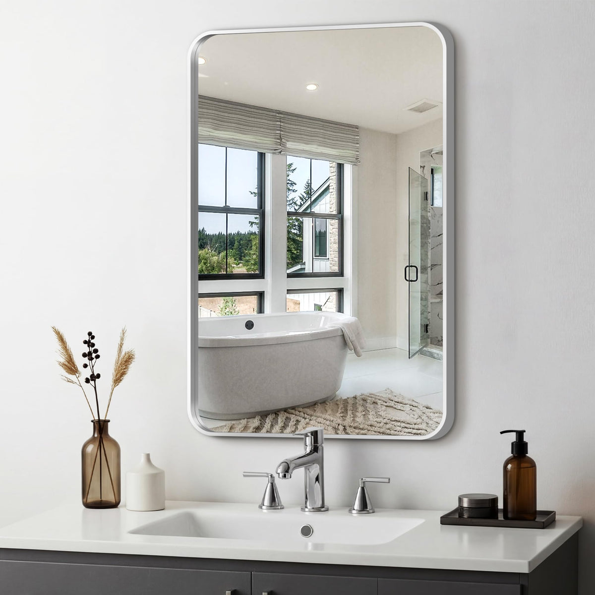 Delma front view silver framed mirror showing sleek contemporary look and clear reflection