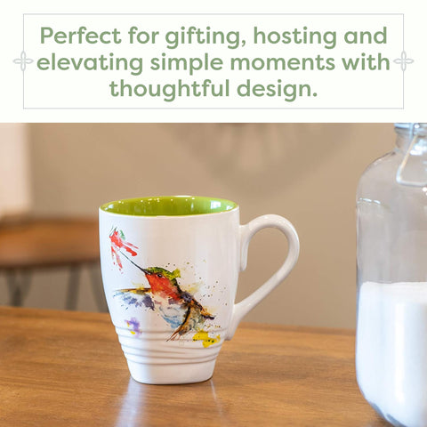 DEMDACO mug held in hand to show scale and comfortable everyday use benefit