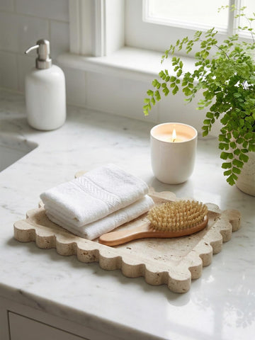 Denique travertine holding jewelry and perfume, showcases functional decorative storage