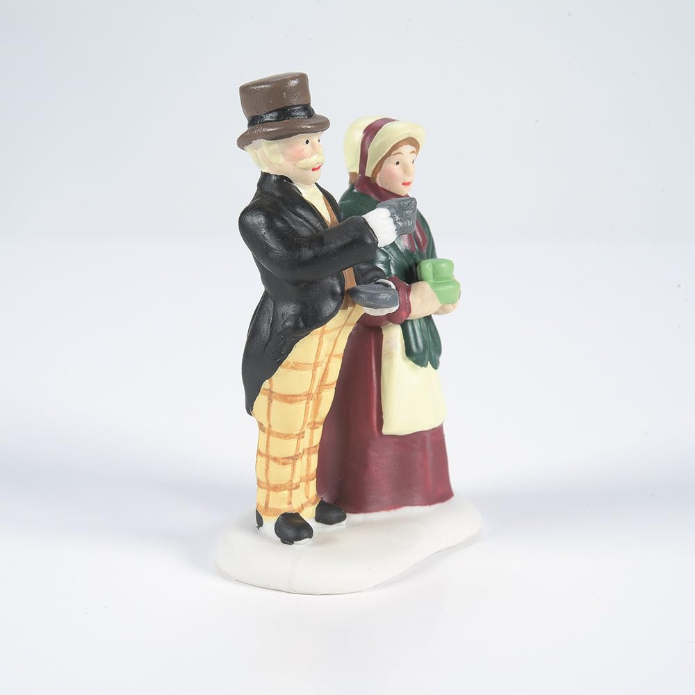 Department 56 in a holiday vignette adding Victorian-era storytelling