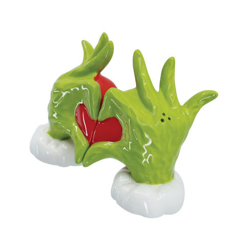 Department 56 Grinch shakers on a holiday table showing festive use and charm