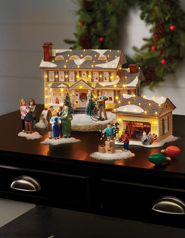 Department 56 Griswold garage beside figurine for scale showing compact display benefit