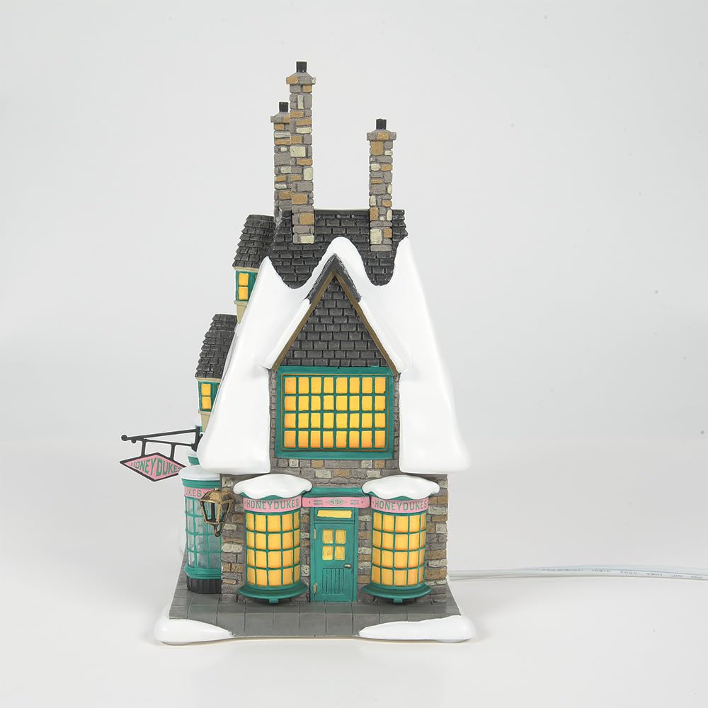 Department 56 Honeydukes next to figurine showing scale and pairing benefit