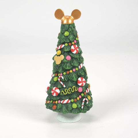 Department 56 candy tree placed in a Disney village setting adding playful focal interest