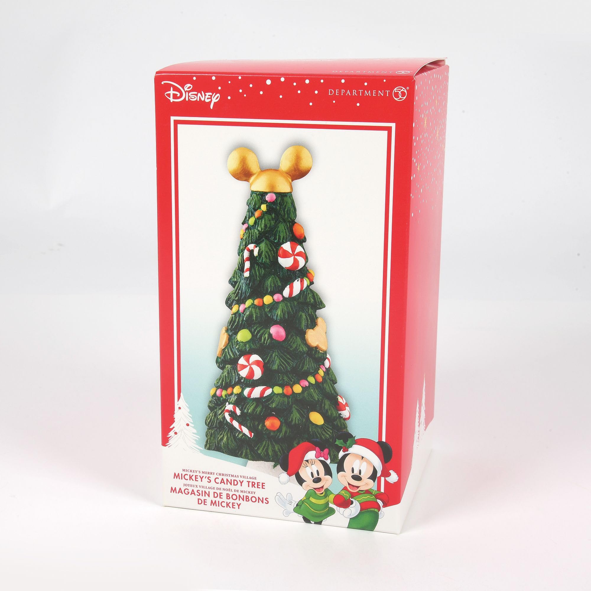 Department 56 lifestyle image of the candy tree on a mantel adding festive color and cheer