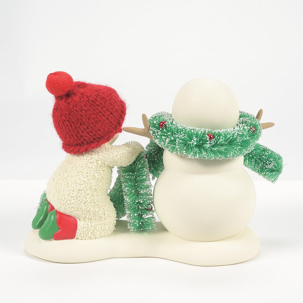 Department 56 Snowbabies lifestyle display on mantel adding cozy holiday character