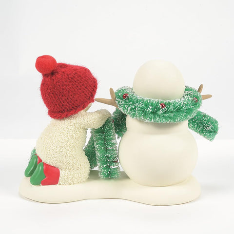 Department 56 Snowbabies lifestyle display on mantel adding cozy holiday character