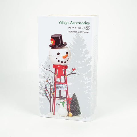 Department 56 watertower in mantel display adding vertical interest and atmosphere