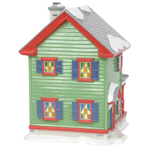Department 56 Aunt Bethany's House close-up of internal lighting giving warm glow