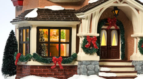 Department 56 interior detail revealing dinner table scene and charm