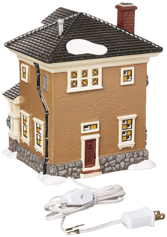 Department 56 lit window close-up displaying warm glow for ambiance