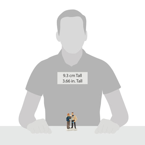 Department 56 figurine next to ruler for scale benefit: small footprint clarity