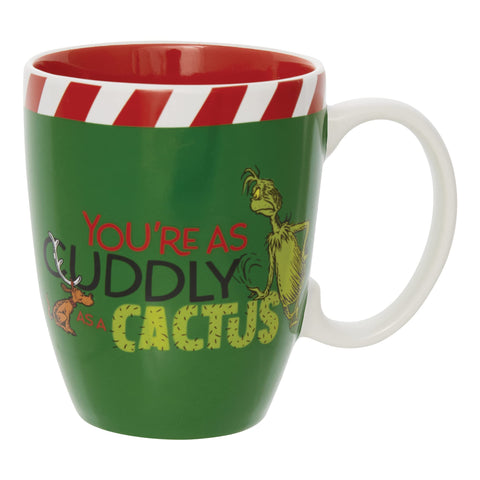 Department 56 Grinch mug held in hand demonstrating size and 12oz capacity for practical use