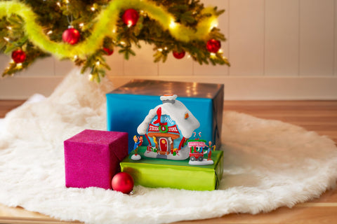 Department 56 placed in village setting creating coordinated holiday scene