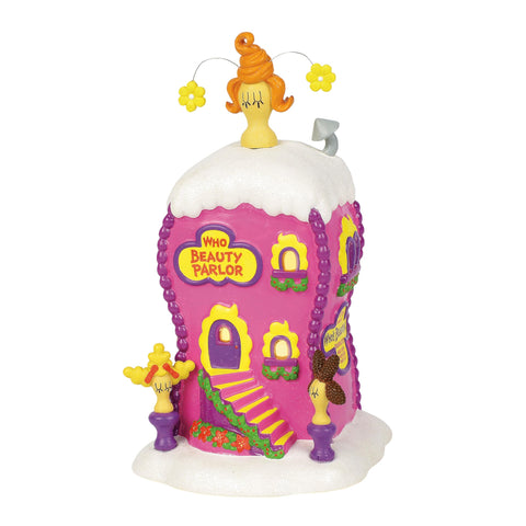 Department 56 La Boutique front view shows whimsical facade and bright colors for display appeal