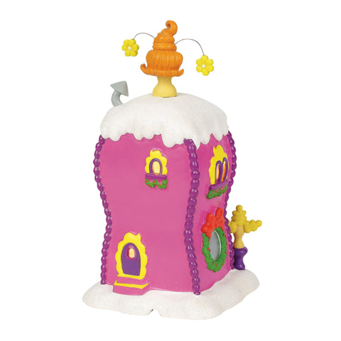 Department 56 lit building at night providing warm glow to village scenes and mood lighting