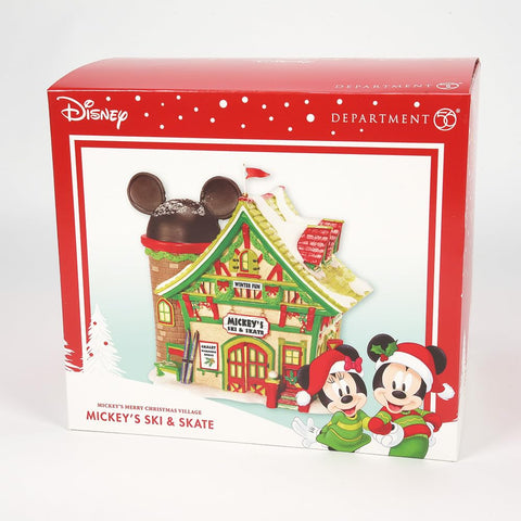 Department 56 chalet on mantel in holiday scene creating festive centerpiece