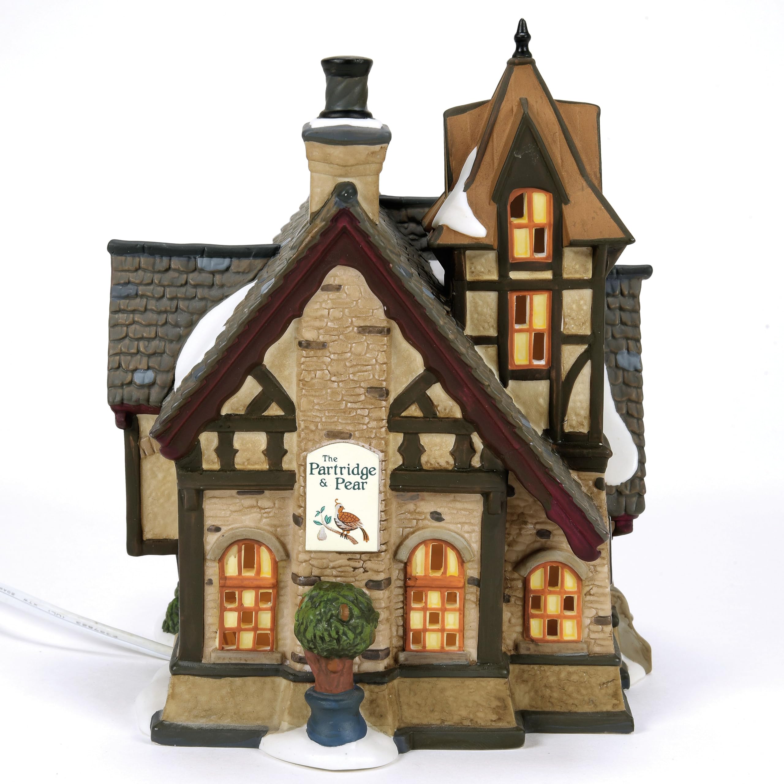 Department 56 placed on a mantel to show scale and display suitability
