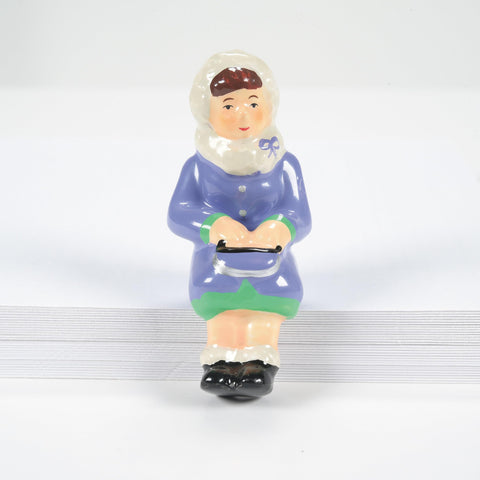 Department 56 individual seated figure hero shot showing accurate scale and pose