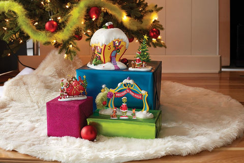 Department 56 Who-ville archway styled on a mantel with seasonal decor to inspire display ideas