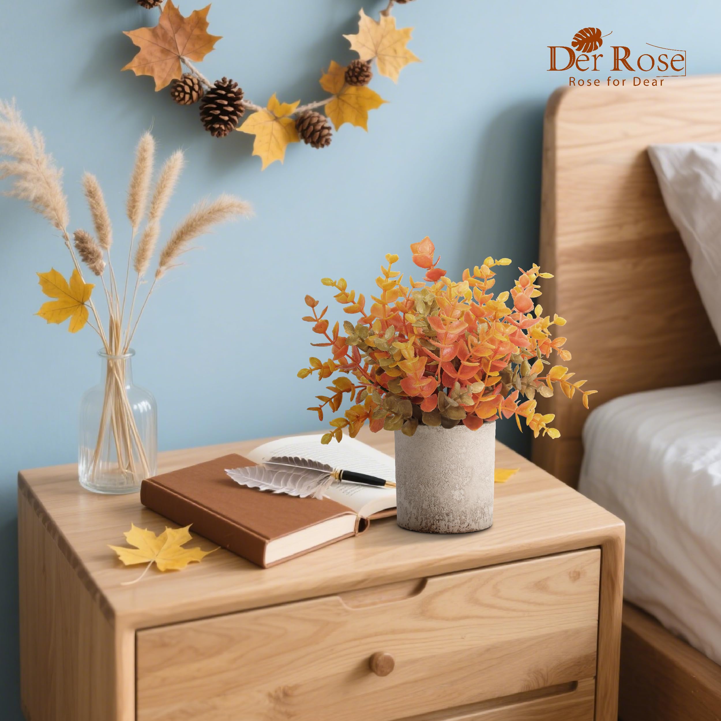 Der Rose on a bathroom shelf adding low-maintenance fall warmth