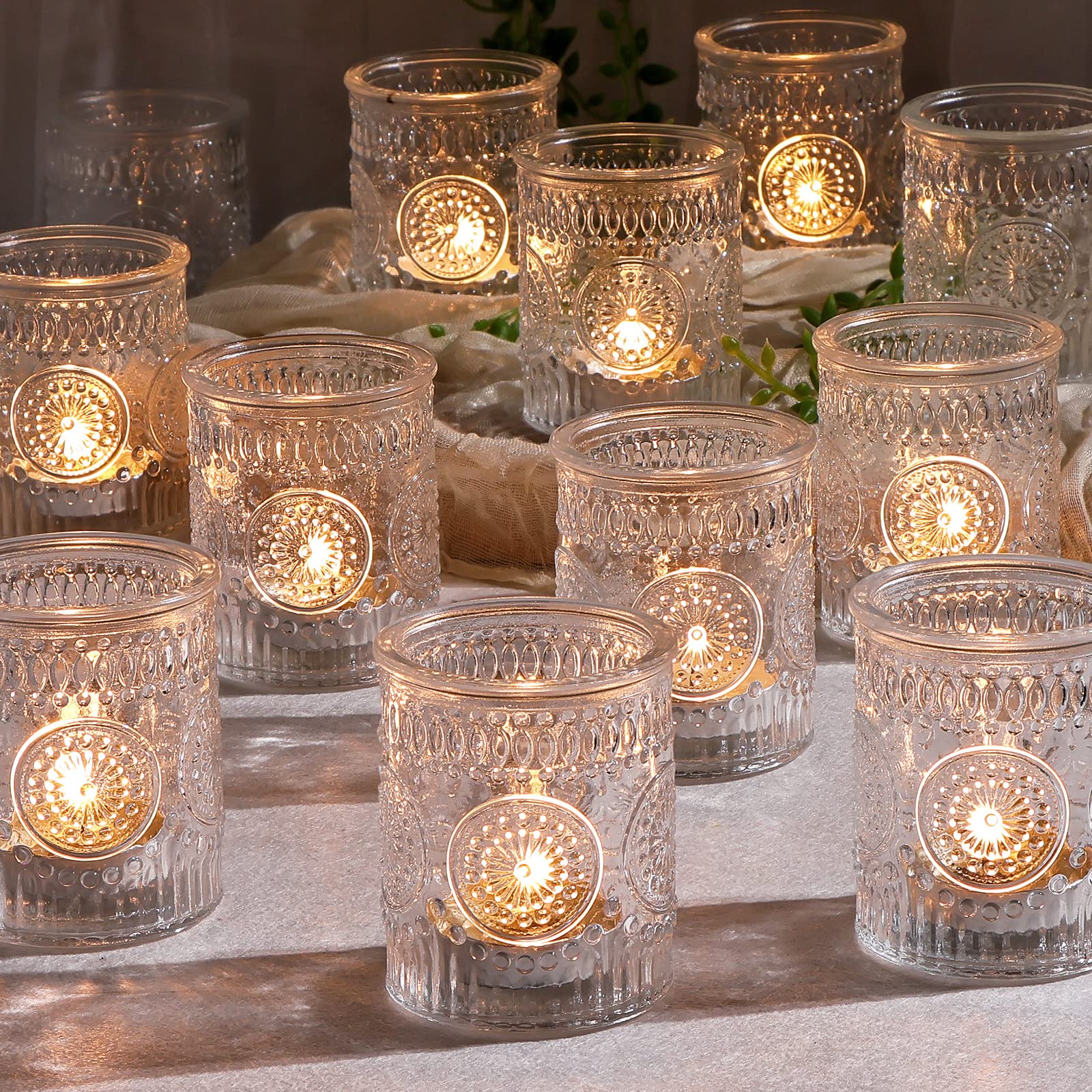 DEVI front view of 24 clear glass votive holders showing set and finish benefits