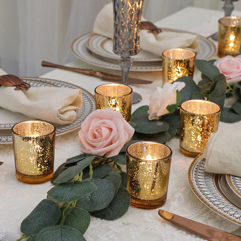 DEVI votive holders used in wedding centerpiece creating warm ambient light