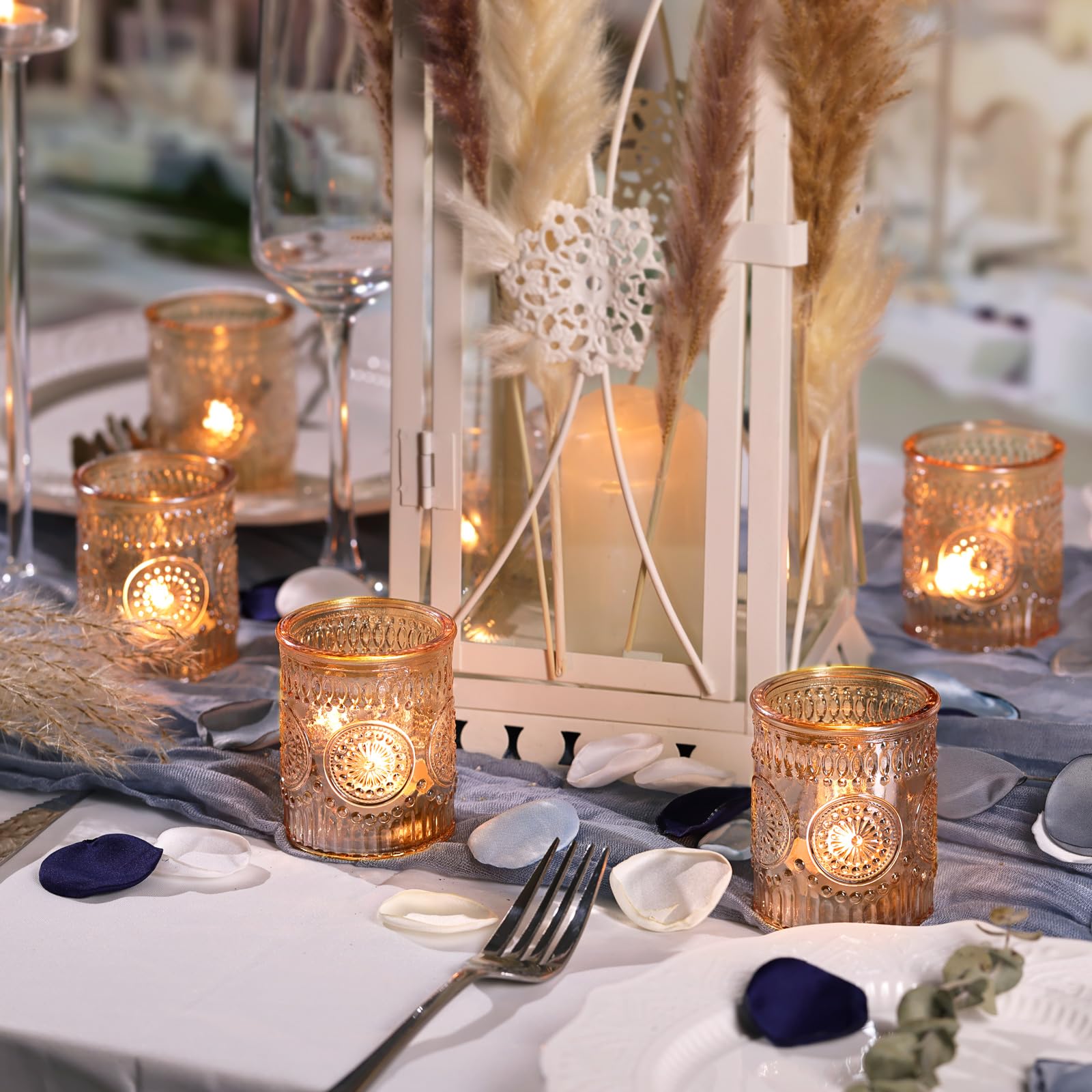 DEVI lit votive holders in centerpiece offering warm ambient lighting benefit