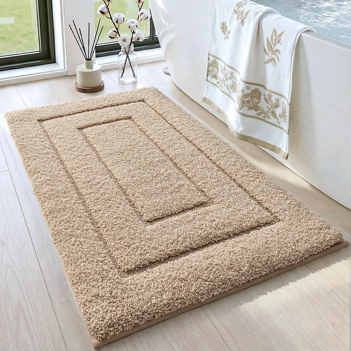 DEXI bath mat front view showing beige color and full coverage; adds comfort