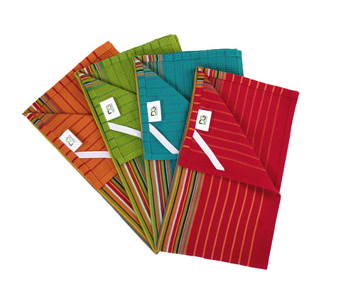 DG Collections towels in washer and a clean pile showing easy-care and reusability benefit