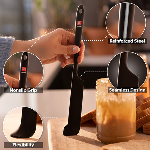 di oro spatula wiping batter from a mixing bowl for neat food prep