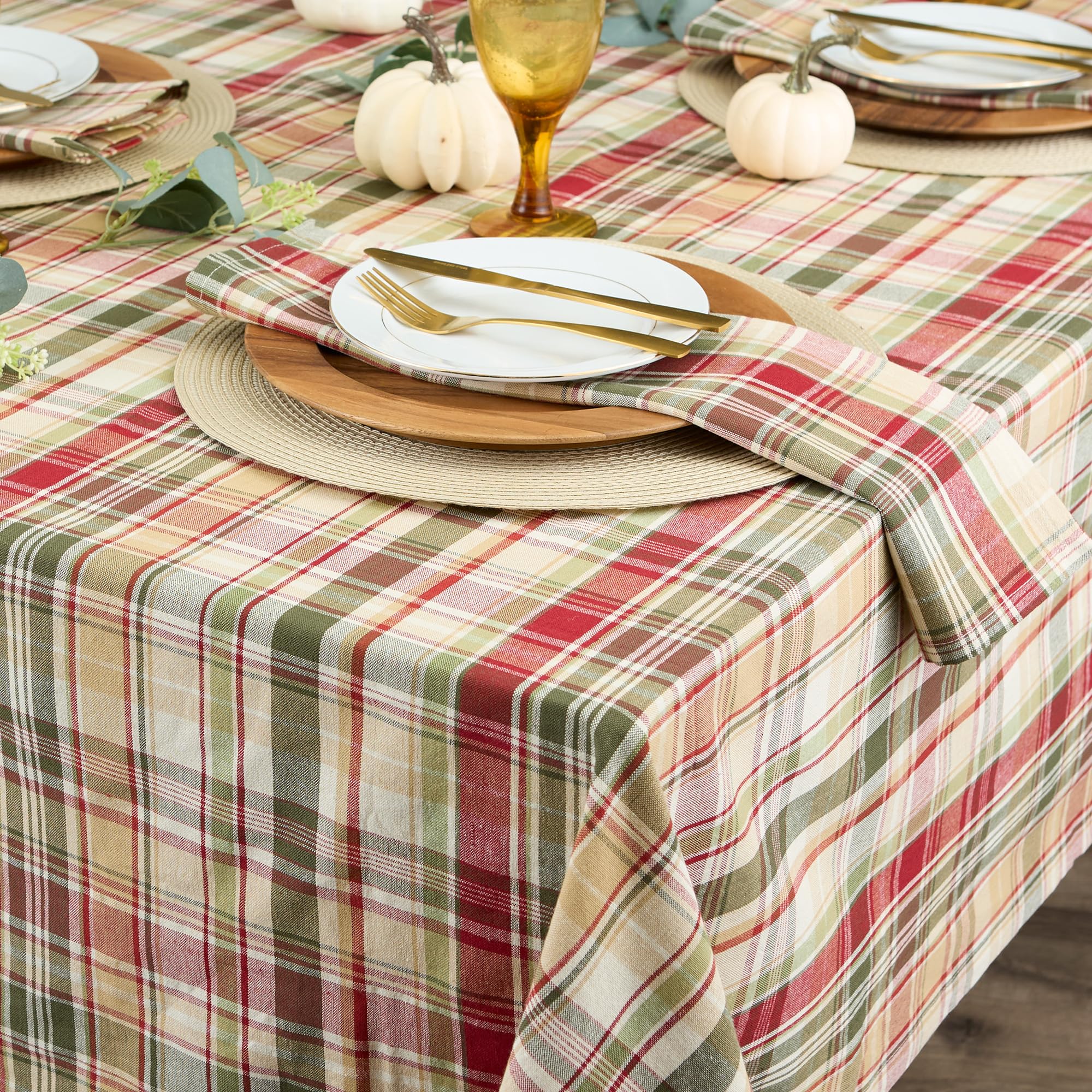 DII tablecloth styled on Thanksgiving table with centerpieces to create inviting atmosphere