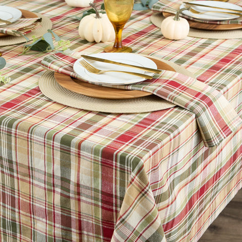 DII tablecloth styled on Thanksgiving table with centerpieces to create inviting atmosphere