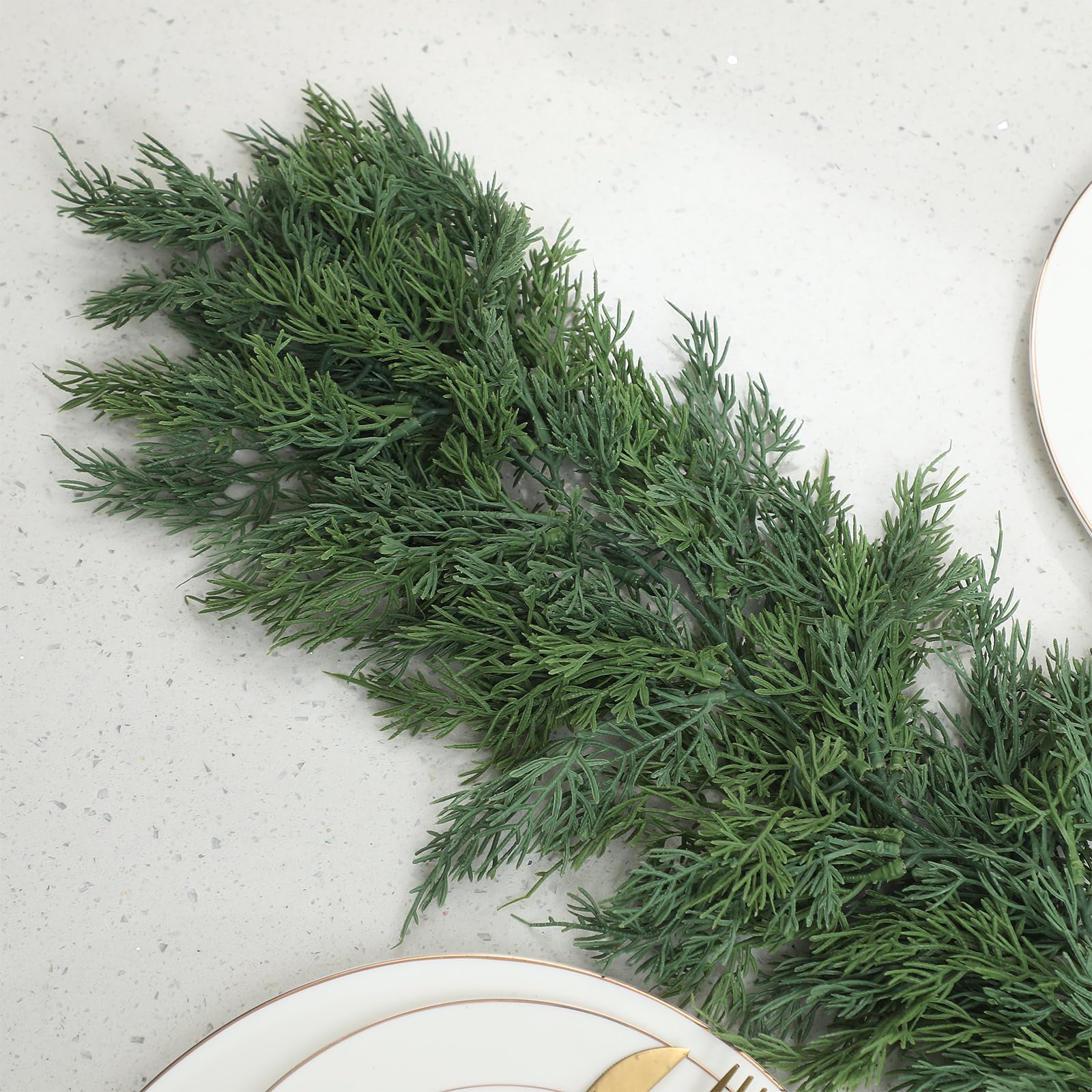 Dingion garland used as a dining table centerpiece creating a polished holiday look