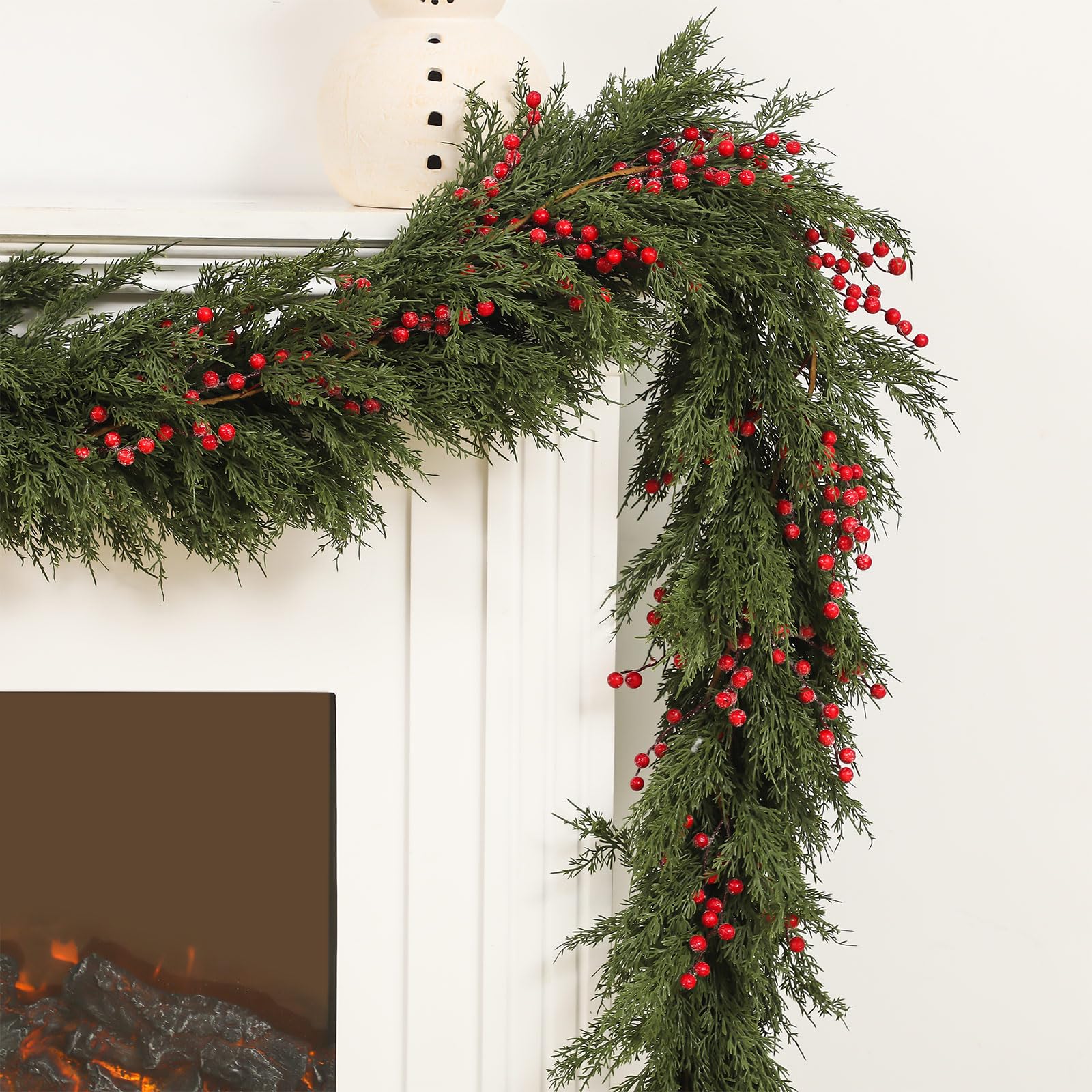 Dingion garland beside ruler showing scale and full nine-foot length advantage
