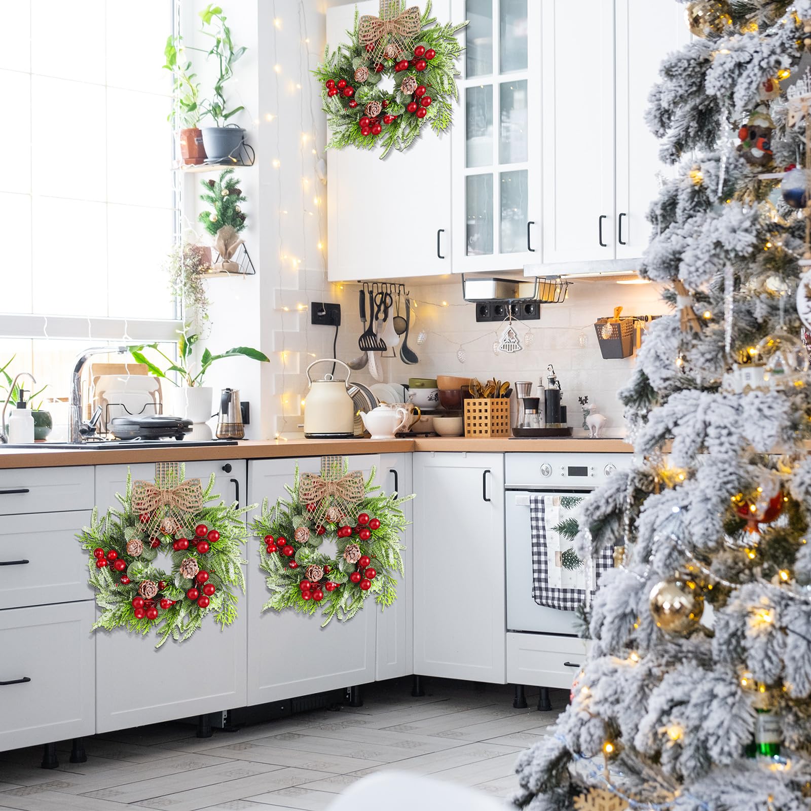 Dingion wreath held next to a hand to show the 9 inch size and easy cabinet fit