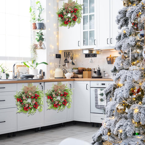 Dingion wreath held next to a hand to show the 9 inch size and easy cabinet fit