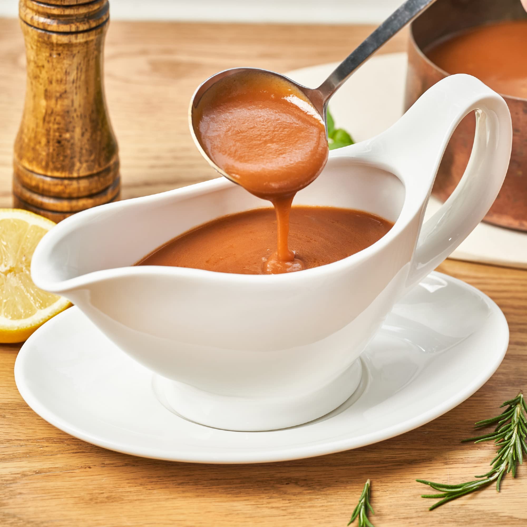 Dinnerlit spout close-up illustrating narrow dripless pour for precise serving control