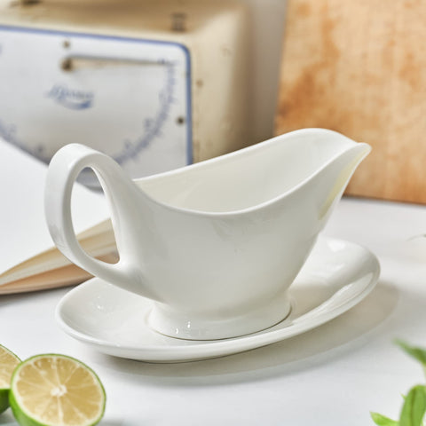 Dinnerlit gravy boat on dressed table highlighting elegant presentation for entertaining