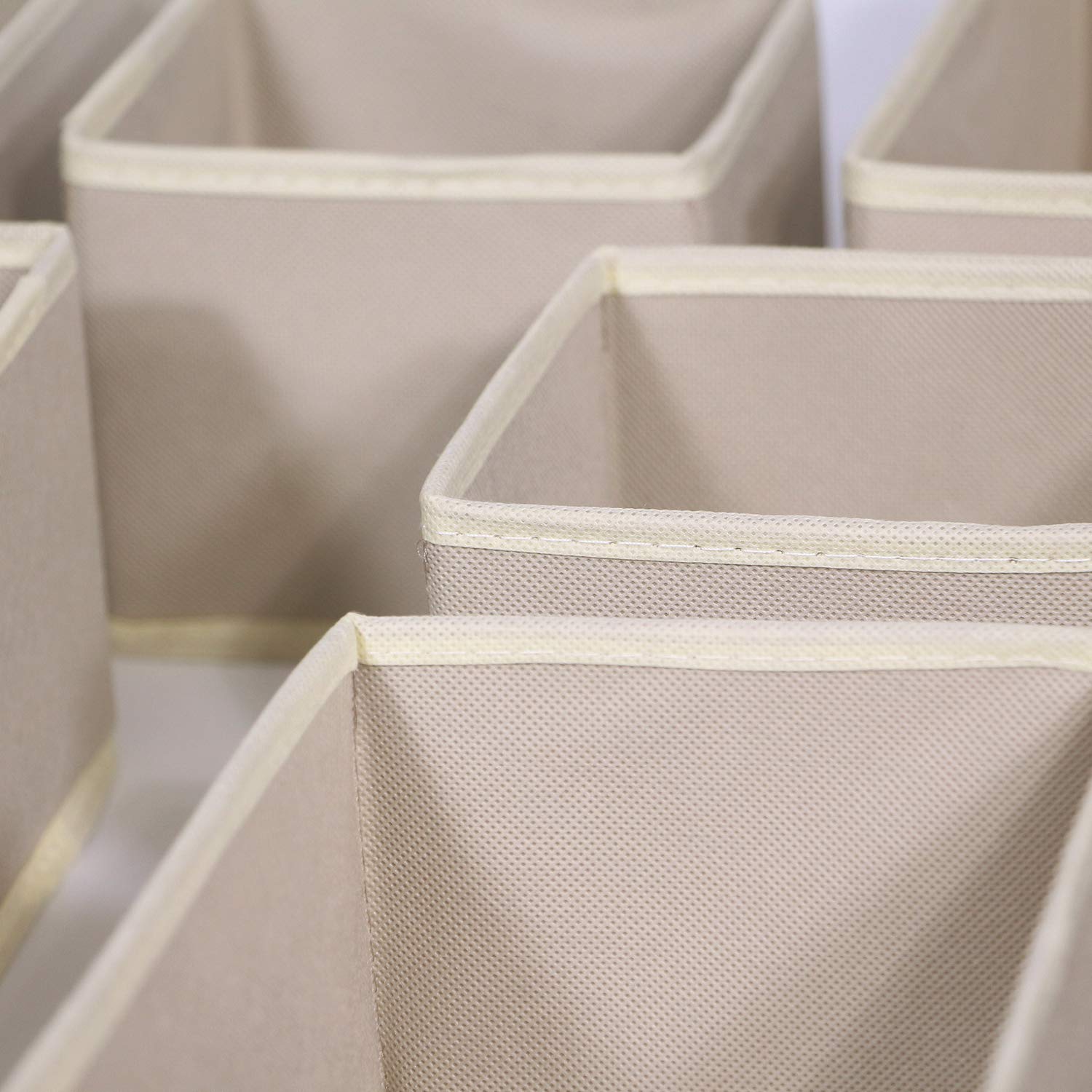DIOMMELL stacked fabric bins on a shelf maximizing vertical space usage